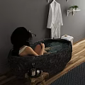Dark Stone Freestanding Bathtub With Bathrobe On Rack Plants Stool And Wooden Floor Rug
