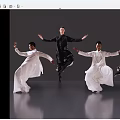 Men in Traditional Robes Performing Dynamic Dance Moves on Reflective Floor with Gray Background