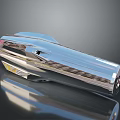 Shiny Silver Sleek Metallic Object With Reflective Surface And Modern Curved Design Details