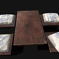Wooden Dining Table With Four Cushions Featuring Blue And White Floral Patterns