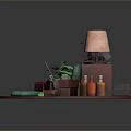 Open Laptop On Red Circular Platform With Green Plants Lamp Camera Radio And Bottles