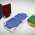 Colorful Folding Lounge Chairs With Fabric Seats And Metal Frames In Blue Red Green Yellow