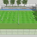 Fenced Football Field with Green Grass Surrounded by Trees and Players Playing