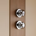 Two Modern Wall Lights with Metal Base and Glass Shades on Wooden Background