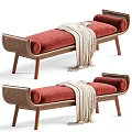Elegant Ottoman With Red Cushion Wooden Frame Woven Details And Draped Blanket
