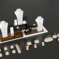 Luxury Jewelry Collection Display With Mannequins Golden Necklaces And White Handbags On Stands