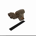 Detailed Carved Wing Sculpture In Stone With Weathered Texture And Black Stand