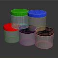 Transparent Plastic Jars With Different Colored Lids Stacked On Reflective Surface
