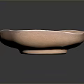 Pink Bowl Shaped Sculpture Carving with Intricate Floral Patterns on Smooth Glossy Surface