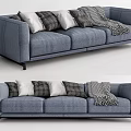 Modern Three Seater Sofa With Plush Cushions And Patterned Throw Blanket 3d model
