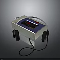 Portable White Electronic Appliance With Blue Display Screen And Attached Black Headphones