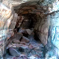 Rugged Cave Terrain Interior With Rocky Formations And Colorful Textures