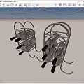 Two Modern Metal Wine Racks Holding Multiple Wine Bottles in Circular Frame Design