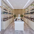 Minimalist Coffee Room Interior Featuring Wooden Shelves Bottled Products Green Plants And White Counter