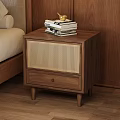Wooden Nightstand With Rattan Panel And Stacked Books In Bedroom Setting