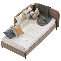 Cozy Chaise Lounge with Multiple Colorful Pillows and Soft Gray Throw Blanket