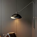 Modern Black Wall Lamp With Metal Arm And Warm Illumination Mounted On Dark Wall