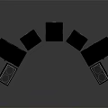 Various Black Audio Speakers In Different Sizes And Shapes On Stands And Floor