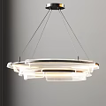 Modern Circular Chandelier Design With Transparent Layers And Illuminated Light