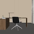 Modern Wooden Desk Interior With Black Chair Table Lamp Books And Small Plant