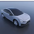 Silver Aerodynamic Electric Car with Modern Sleek Body Styling Futuristic Front Face and Alloy Wheels