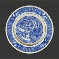 Intricate Sculptural Carving On Ceramic Plate With Blue White Pattern And Ornate Design