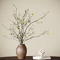 Minimalist Brown Ceramic Vase With Green Leaf Branches And White Decorative Balls On Light Background