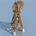Wooden Windmill Structure With Metal Blades And White Base Against Blue Sky