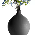 Black Ceramic Vase With Blue Blooming Flowers And Green Leaves For Home Decor