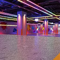 Spacious Modern Fitness Studio With Colorful Neon Lights And Graffiti Pillars