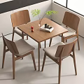 Modern Wooden Negotiation Table and Chairs with Upholstered Seats Green Plant and Magazine