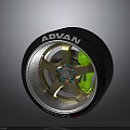 Car Wheel With ADVAN Brand Golden Rim And Green Brake Caliper Design