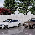 White And Brown Cars Parked By Gray Stone Wall With Modern White Sculptures