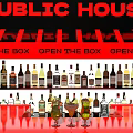 Public House Interior With Open The Box Sign Wine Racks And Red Bar Counter