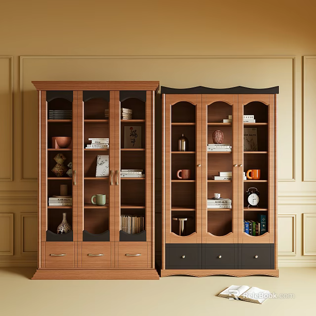 Two Wooden Bookcases With Glass Doors Books Mugs Decorative Items And Beige Wall Paneling 3d model 