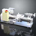Industrial Lathe Machine With Yellow Control Panel And Rotating Metal Components