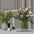 Elegant Glass and Gold Vases with Pink Roses Green Foliage and White Flowers on Table
