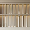 White Roman Columns Display in Two Tiers with Various Classical Orders 3d model