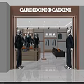 Modern Men's Clothing Store Interior With Suits Shirts Mannequins Sofa And Coffee Table