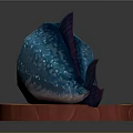 Sliced Fish With Blue Spotted Exterior And Red Interior On Circular Red Wooden Base