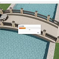 Scenic Landscape Bridge With Car Black Railing Stone Pillars Over Blue Water Area And Grass