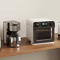 Essential Kitchen Appliances Toaster Coffee Maker Toaster Oven On Wooden Countertop