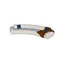 Modern White Irregular Sofa With Curved Design Blue Cushions And Brown Blanket