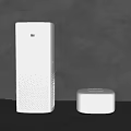 White MI Smart Devices On Tabletop With Gray Background And Wooden Accents