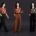 Three Women In Stylish Floral Shirts And Wide Leg Pants With Handbag