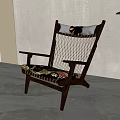 Wooden Frame Lounge Chair With Woven Backrest And Patterned Cushion Near Green Plant