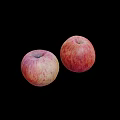 Two Fresh Ripe Red Pink Apples with Yellow Spots on Black Background