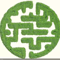 Green Plant Wall Design Featuring Circular Maze Pattern And Lush Foliage