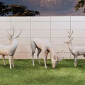 Landscape Sculptures Featuring Three White Deer On Green Grass With Wall And Trees Under Sky