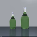 Two Large And Small Green Wine Bottles On Grey Table With White Caps And Labels